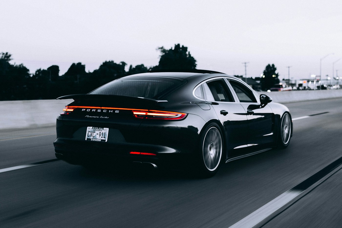 A silver sports car with a polished exterior
